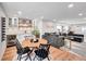 Finished basement featuring a wet bar and dining area at 11960 S Allerton Cir, Parker, CO 80138