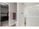Bathroom with shower, toilet and walk in closet at 16231 E Warner Pl, Denver, CO 80239