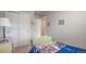 bedroom with twin bed and dresser at 16231 E Warner Pl, Denver, CO 80239