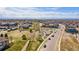 Aerial view showcasing a neighborhood with a playground and walking paths at 16231 E Warner Pl, Denver, CO 80239
