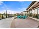 Community patio with fire pit and comfortable seating at 16231 E Warner Pl, Denver, CO 80239