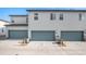 Two car garage with additional storage at 16231 E Warner Pl, Denver, CO 80239