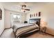 Bright bedroom with carpeted floors and a window offering natural light at 20816 E Shefield Pl, Parker, CO 80138