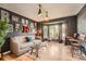 Mid-century modern living room with hardwood floors at 20816 E Shefield Pl, Parker, CO 80138