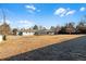 Large backyard with view of house and surrounding area at 9840 W 36Th Ave, Wheat Ridge, CO 80033