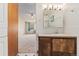 Bathroom vanity with mirror and view into bedroom at 650 S Alton Way # 5D, Denver, CO 80247