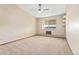 Bright bedroom with carpeted floor, ceiling fan and window at 650 S Alton Way # 5D, Denver, CO 80247