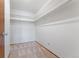 Large walk-in closet with shelving and carpet flooring at 650 S Alton Way # 5D, Denver, CO 80247