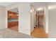 Bright entryway with wood flooring and kitchen access at 650 S Alton Way # 5D, Denver, CO 80247