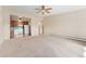 Spacious living room with open floor plan and kitchen access at 650 S Alton Way # 5D, Denver, CO 80247