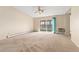 Living room with access to balcony and kitchen at 650 S Alton Way # 5D, Denver, CO 80247