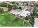 Community overview with a golf course, pool, and residential buildings at 650 S Alton Way # 5D, Denver, CO 80247