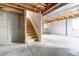 Unfinished basement with stairs and ample space at 17606 Hoyt Pl, Parker, CO 80134