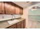 Bright kitchen boasts wood cabinets and a modern faucet at 1150 Golden Cir # 511, Golden, CO 80401