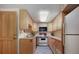 Efficient galley kitchen, featuring ample cabinetry and modern appliances at 3015 3Rd St, Boulder, CO 80304