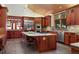 Spacious kitchen with wooden cabinets, stainless steel appliances and an island at 3015 3Rd St, Boulder, CO 80304