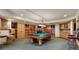 Finished basement includes a pool table, built-in shelving, and a wet bar at 3015 3Rd St, Boulder, CO 80304