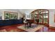 Music room featuring hardwood floors, large windows, and a grand piano at 3015 3Rd St, Boulder, CO 80304