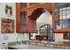 Kitchen features a breakfast bar, custom wood cabinets, and a view into the living room at 3015 3Rd St, Boulder, CO 80304