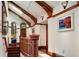 Stunning hallway with hardwood floors, wooden beams, and artwork at 3015 3Rd St, Boulder, CO 80304