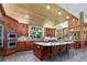 Gourmet kitchen with wooden cabinets, stainless steel appliances, and an island at 3015 3Rd St, Boulder, CO 80304