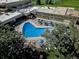 Relaxing outdoor pool area with surrounding landscaping, visible from above at 690 S Alton Way # 1C, Denver, CO 80247