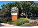Attractive entrance to Windsor Gardens, with landscaping and signage at 690 S Alton Way # 1C, Denver, CO 80247