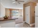 Kitchen view of living room and access to patio at 690 S Alton Way # 1C, Denver, CO 80247