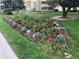 Vibrant flowerbed with colorful blooms and lush greenery at 690 S Alton Way # 1C, Denver, CO 80247