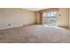 Living room with access to outdoor balcony at 690 S Alton Way # 1C, Denver, CO 80247