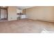 Living Room with view of kitchen and entrance at 690 S Alton Way # 1C, Denver, CO 80247