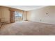 Living room with sliding door to balcony at 690 S Alton Way # 1C, Denver, CO 80247