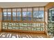 Sunroom with expansive windows offering a view of the landscape at 690 S Alton Way # 1C, Denver, CO 80247
