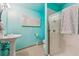 Basement bathroom with shower and pedestal sink at 3081 W 151St Ct, Broomfield, CO 80023