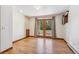 Spacious basement bedroom with hardwood floors and access to private patio at 3081 W 151St Ct, Broomfield, CO 80023