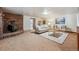 Spacious basement living area with wood-burning stove at 3081 W 151St Ct, Broomfield, CO 80023