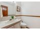 Clean bathroom with a single vanity and toilet at 3081 W 151St Ct, Broomfield, CO 80023