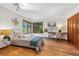 Charming bedroom with wood floors and built-in desk at 3081 W 151St Ct, Broomfield, CO 80023
