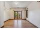 Bright bonus room with hardwood floors and access to private deck at 3081 W 151St Ct, Broomfield, CO 80023
