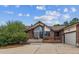 Brick home with a large entryway and attached two-car garage at 3081 W 151St Ct, Broomfield, CO 80023