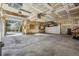 Spacious garage with ample storage space and an overhead door at 3081 W 151St Ct, Broomfield, CO 80023