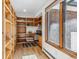 Well-organized pantry with built-in shelves and a workspace at 3081 W 151St Ct, Broomfield, CO 80023
