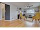 Living room boasts hardwood floors and a wood-burning stove at 711 S Mariposa Way, Denver, CO 80223