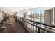 Elevated walkway overlooking the fitness center and pool area at 2001 Lincoln St # 1823, Denver, CO 80202