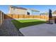 Backyard with artificial turf and patio at 1741 Zephyr St, Brighton, CO 80603