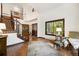 Living room with hardwood floors, high ceilings, and views at 1893 Silverheels Dr, Larkspur, CO 80118