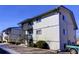 Building exterior, showing multiple units and parking at 7525 W 62Nd Ave # 11, Arvada, CO 80003