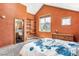 Large bedroom with en-suite bathroom and built-in shelving at 4720 W 37Th Ave # 29, Denver, CO 80212