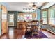 Bright dining area with hardwood floors and a table for four at 4720 W 37Th Ave # 29, Denver, CO 80212