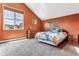 Spacious bedroom with vaulted ceiling, large windows, and wood furniture at 4720 W 37Th Ave # 29, Denver, CO 80212